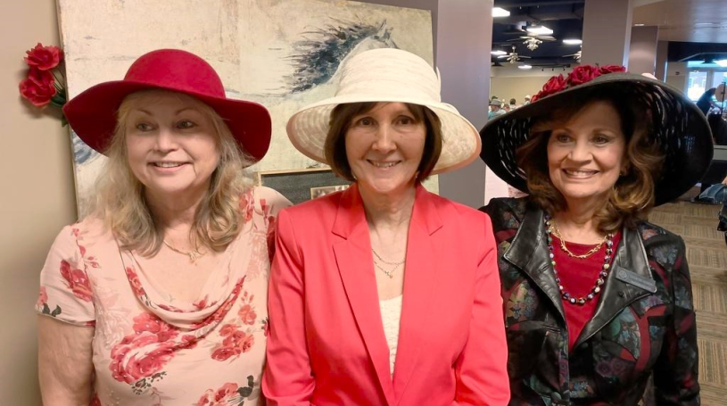 Deb H., Marlene G., Marilyn C. showing off their hats