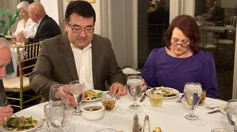 Enjoying conversation and dinner